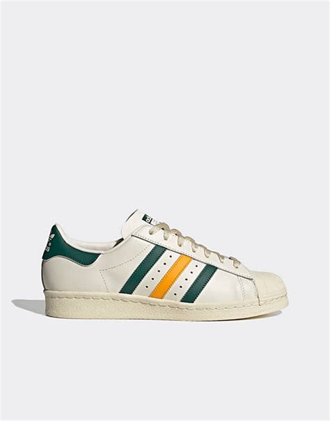 adidas schuhe mit gelben streifen|Adidas Superstar .